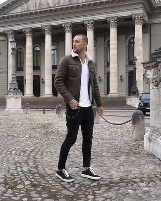 Brown Shearling Jacket Outfits For Men: If you're in search of a casual and at the same time sharp look, consider pairing a brown shearling jacket with black ripped skinny jeans. If you want to instantly step up this outfit with one single piece, add dark brown suede low top sneakers to the equation.