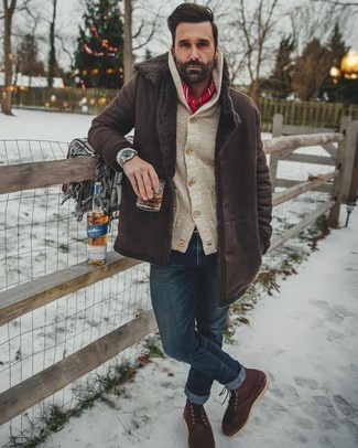 Red Tie Outfits For Men: This combo of a dark brown shearling jacket and a red tie can only be described as incredibly stylish and classy. When this outfit is just too much, dial it down by rocking a pair of dark brown suede casual boots.