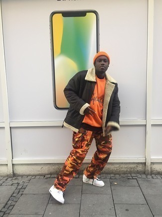 Orange Cargo Pants Outfits: Pair a dark brown shearling jacket with orange cargo pants to feel absolutely confident and look trendy. And if you need to effortlessly dial down this outfit with a pair of shoes, introduce a pair of white leather high top sneakers to the equation.