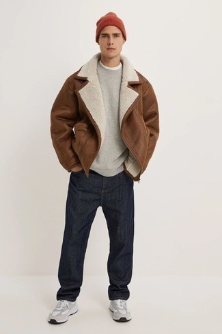 Men's Brown Shearling Jacket, Grey Sweatshirt, Navy Jeans, Grey Athletic Shoes