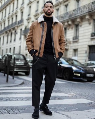 Tan Shearling Jacket Outfits For Men: A tan shearling jacket and black chinos paired together are a perfect match. Finish this ensemble with black suede derby shoes for an on-trend mix.