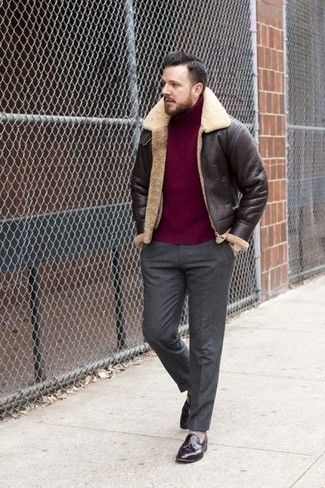 Burgundy Wool Turtleneck Outfits For Men: Wear a burgundy wool turtleneck and charcoal dress pants to look like a real gent at all times. A pair of dark brown leather tassel loafers looks right at home paired with this outfit.