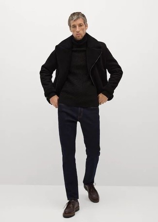 Black Knit Turtleneck Outfits For Men: A black knit turtleneck and navy jeans are a good combo worth integrating into your day-to-day styling collection. To give your outfit a more elegant twist, complete this outfit with a pair of dark brown leather desert boots.