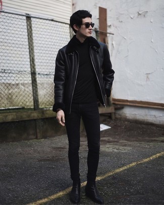 Black Shearling Jacket Outfits For Men: For a cool and casual ensemble, consider pairing a black shearling jacket with black skinny jeans — these two items fit beautifully together. Get a little creative in the shoe department and introduce black leather chelsea boots to your ensemble.