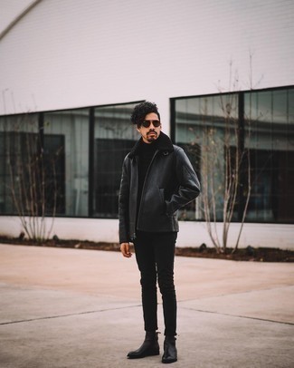 Black Skinny Jeans Outfits For Men: Who said you can't make a fashionable statement with a laid-back look? Make heads turn in a black shearling jacket and black skinny jeans. For something more on the elegant side to complement your ensemble, complement your ensemble with black leather chelsea boots.