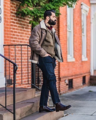 Brown Shearling Jacket Outfits For Men: This combo of a brown shearling jacket and navy jeans is put together and yet it looks relaxed and ready for anything. Introduce dark brown leather chelsea boots to the equation for an instant style injection.