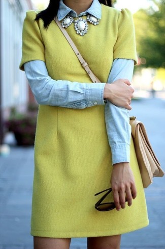 Women's Green-Yellow Shift Dress, Light Blue Denim Shirt, Beige Leather Crossbody Bag, Dark Brown Sunglasses