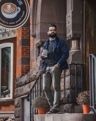 Charcoal Cable Sweater Outfits For Men: When the situation allows a casual menswear style, make a charcoal cable sweater and grey jeans your outfit choice. A pair of dark brown leather brogue boots will spruce up this look.