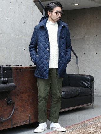 Navy Quilted Shirt Jacket Outfits For Men: This laid-back pairing of a navy quilted shirt jacket and olive chinos is capable of taking on different forms depending on how you style it out. Hesitant about how to round off? Complement your look with a pair of white canvas high top sneakers to spice things up.