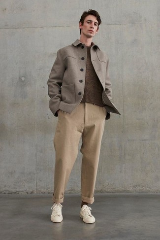 Grey Wool Shirt Jacket Outfits For Men: If you don't take your personal style lightly, go for a casually smart ensemble in a grey wool shirt jacket and khaki chinos. Balance this outfit with a more relaxed kind of shoes, like this pair of beige canvas low top sneakers.