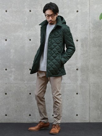 Olive Quilted Shirt Jacket Outfits For Men: Go for an olive quilted shirt jacket and khaki chinos to put together an everyday look that's full of charisma and personality. Bump up this outfit by rounding off with brown leather derby shoes.