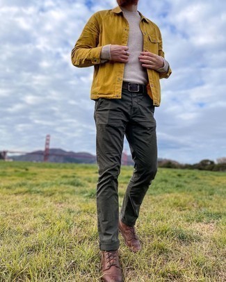 Mustard Shirt Jacket Outfits For Men: If the dress code calls for a semi-casual getup, wear a mustard shirt jacket with dark green chinos. Dark brown leather casual boots are a stylish addition to this outfit.