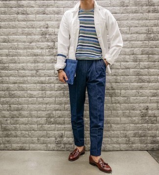 Multi colored Crew-neck Sweater Outfits For Men: A multi colored crew-neck sweater and navy dress pants are a smart pairing that will get you the proper amount of attention. We love how cohesive this outfit looks when finished off by brown leather tassel loafers.