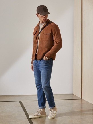 Brown Suede Shirt Jacket Outfits For Men: Why not try pairing a brown suede shirt jacket with navy jeans? These items are super practical and look awesome paired together. To inject a dash of stylish nonchalance into your ensemble, complement this look with beige canvas high top sneakers.