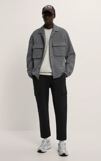 Men's Outfits 2022: This laid-back pairing of a grey wool shirt jacket and black cargo pants is ideal when you need to go about your day with confidence in your outfit. Introduce a pair of grey athletic shoes to the mix to keep the ensemble fresh.