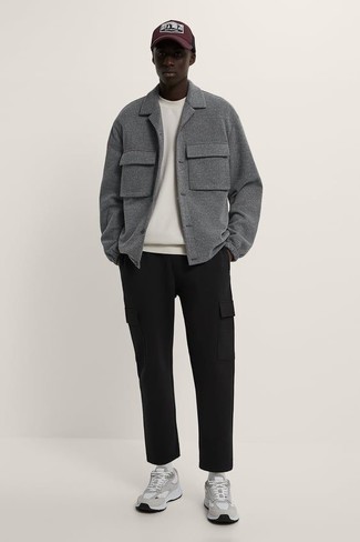 Grey Wool Shirt Jacket Outfits For Men: This laid-back combination of a grey wool shirt jacket and black cargo pants is a never-failing option when you need to look stylish but have zero time. To infuse a laid-back vibe into your getup, introduce a pair of grey athletic shoes to the equation.