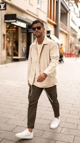 Brown Cargo Pants Outfits: Pair a beige corduroy shirt jacket with brown cargo pants to create an everyday ensemble that's full of charm and character. To give your overall look a more laid-back vibe, why not complete your ensemble with white canvas low top sneakers?
