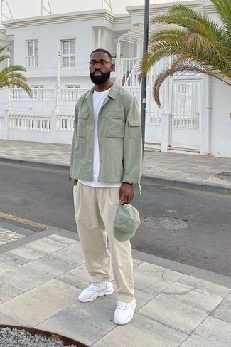 Beige Chinos Casual Outfits: When the dress code calls for a casually sleek outfit, pair a mint shirt jacket with beige chinos. Finishing off with white athletic shoes is a simple way to add a sense of stylish effortlessness to this getup.