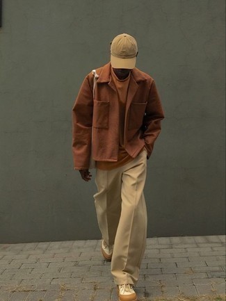 Mustard Shirt Jacket Outfits For Men: Go for a pared down yet stylish option by wearing a mustard shirt jacket and khaki chinos. And if you wish to immediately tone down your ensemble with one item, why not introduce white canvas low top sneakers to the equation?