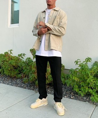 Beige Low Top Sneakers Outfits For Men: This classic and casual combination of a beige shirt jacket and black chinos is capable of taking on different forms depending on how it's styled. Make your look less formal by finishing with a pair of beige low top sneakers.
