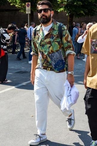 Navy Backpack Outfits For Men: For a laid-back look, wear an olive camouflage shirt jacket and a navy backpack — these items play pretty good together. In the shoe department, go for something on the more elegant end of the spectrum by sporting a pair of white canvas low top sneakers.