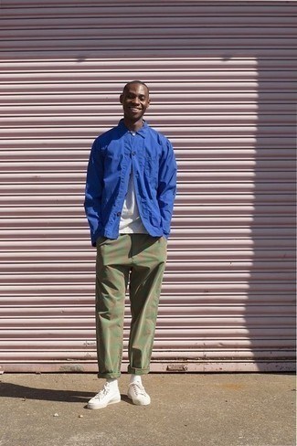Blue Shirt Jacket Outfits For Men In Their 30s: Nail the effortlessly smart ensemble in a blue shirt jacket and olive chinos. Give a more casual twist to an otherwise mostly classic look with white canvas low top sneakers. Wondering how to nail casual looks well into your 30s? This combo is a great illustration.