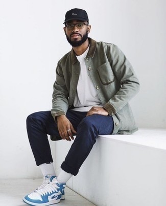 White and Blue Leather High Top Sneakers Outfits For Men: A mint shirt jacket and navy chinos are the ideal way to introduce extra polish into your day-to-day collection. Tone down the classiness of your look with white and blue leather high top sneakers.