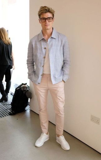 Light Blue Shirt Jacket Outfits For Men: If the setting calls for a polished yet knockout look, team a light blue shirt jacket with pink chinos. Add a touch of stylish casualness to by sporting white athletic shoes.
