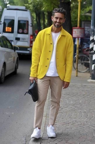 Yellow Shirt Jacket Outfits For Men: Go for sophisticated style in a yellow shirt jacket and beige chinos. Feeling creative? Switch things up by finishing off with white athletic shoes.