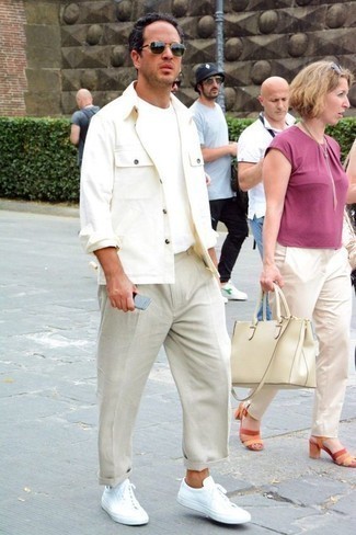 White Shirt Jacket Outfits For Men: You'll be surprised at how super easy it is for any man to pull together this effortlessly smart outfit. Just a white shirt jacket and beige chinos. Bring a more casual twist to this outfit by rounding off with white canvas low top sneakers.