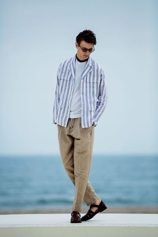 White and Blue Vertical Striped Shirt Jacket Outfits For Men: Go for a straightforward but cool and casual choice by putting together a white and blue vertical striped shirt jacket and khaki chinos. In the shoe department, go for something on the relaxed end of the spectrum by slipping into dark brown leather sandals.