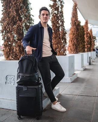 Black Suitcase Outfits For Men: A navy shirt jacket and a black suitcase are a bold casual combination that every trendsetting gentleman should have in his wardrobe. A pair of white canvas low top sneakers immediately smartens up the outfit.