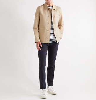 Beige Shirt Jacket Outfits For Men: A beige shirt jacket and charcoal chinos are the perfect way to introduce a dose of manly sophistication into your current casual routine. Complete your getup with a pair of white leather low top sneakers to avoid looking overdressed.