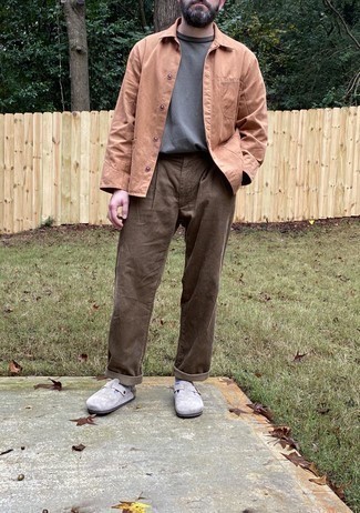 Brown Chinos Outfits: Such items as a tan shirt jacket and brown chinos are the perfect way to infuse a dose of masculine refinement into your day-to-day outfit choices. Finish this look with a pair of grey suede monks for a stylish on and off-duty mix.