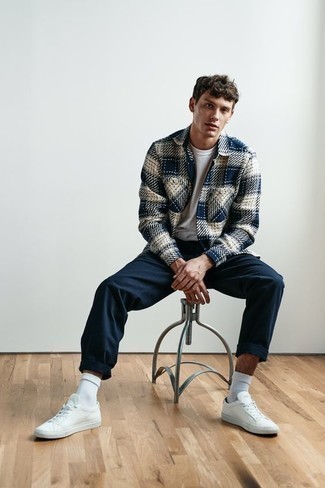 Blue Plaid Shirt Jacket Outfits For Men: In situations comfort is crucial, wear a blue plaid shirt jacket and navy chinos. Dial down the classiness of your outfit by slipping into white leather low top sneakers.