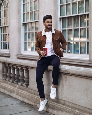 Dark Brown Shirt Jacket Outfits For Men: For a winning smart option, you can rely on this combination of a dark brown shirt jacket and navy chinos. Complement your getup with white canvas low top sneakers to instantly bump up the style factor of this look.