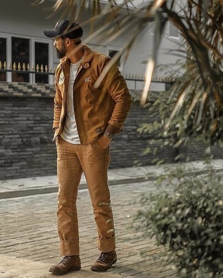 Dark Brown Suede Casual Boots Outfits For Men: Combining a tobacco shirt jacket with khaki chinos is an on-point choice for a casually classy look. Add a pair of dark brown suede casual boots to the mix and the whole outfit will come together.