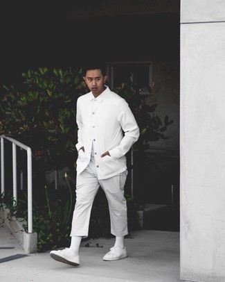 White Shirt Jacket Outfits For Men: A white shirt jacket and grey chinos are a combo that every fashion-savvy man should have in his wardrobe. Complete your look with white canvas low top sneakers to make the look current.