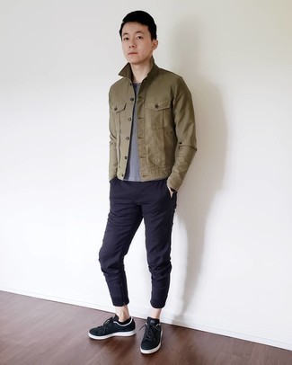 Brown Shirt Jacket Outfits For Men: Such staples as a brown shirt jacket and navy chinos are the ideal way to infuse extra sophistication into your casual rotation. To add an easy-going touch to this ensemble, complement your outfit with black canvas low top sneakers.