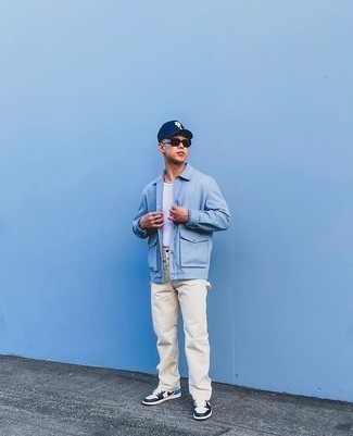 Light Blue Shirt Jacket Outfits For Men: For an ensemble that's worthy of a modern fashion-forward guy and casually sleek, consider wearing a light blue shirt jacket and beige chinos. To introduce a little edge to this ensemble, complement your ensemble with white and navy leather low top sneakers.