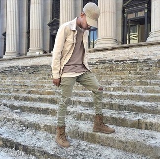 Beige Shirt Jacket Outfits For Men: A beige shirt jacket and olive ripped jeans are the kind of a no-brainer off-duty combination that you need when you have no time to dress up. Got bored with this outfit? Let brown canvas work boots spice things up.