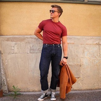 Red Crew-neck T-shirt Outfits For Men: If you like laid-back combos, then you'll like this combination of a red crew-neck t-shirt and navy jeans. Add black and white canvas high top sneakers to the mix to add a touch of stylish effortlessness to this look.