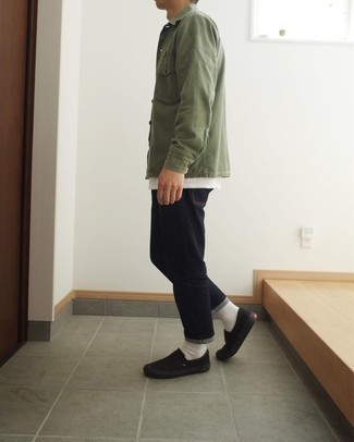 Olive Shirt Jacket Outfits For Men: This combination of an olive shirt jacket and black jeans delivers comfort and relaxed cool. Black canvas slip-on sneakers are the ideal complement to your look.