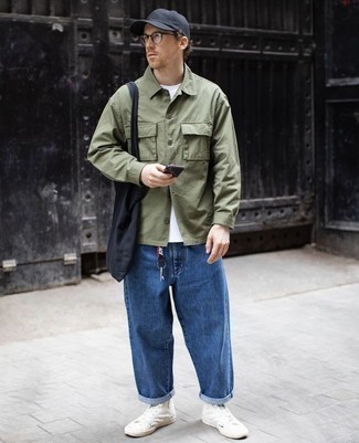 Blue Jeans Outfits For Men: Putting together an olive shirt jacket and blue jeans will prove your skills in men's fashion even on lazy days. Punch up this getup with white canvas high top sneakers.