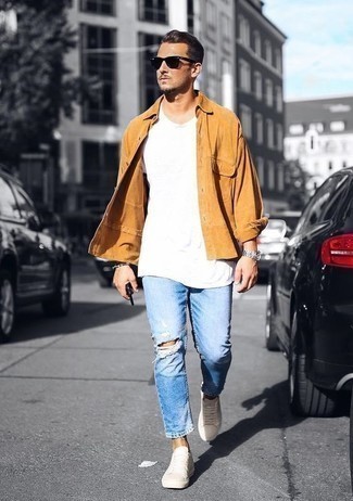 Black Sunglasses Relaxed Outfits For Men: Marry a tan corduroy shirt jacket with black sunglasses to put together an interesting and laid-back outfit. Avoid looking too casual by finishing with white leather low top sneakers.