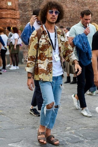 Brown Leather Sandals Outfits For Men: Go for something contemporary in a tan camouflage shirt jacket and light blue ripped jeans. Want to go easy with footwear? Add brown leather sandals to your getup for the day.