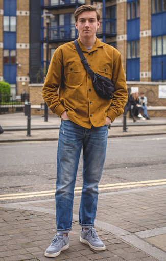 Black Canvas Fanny Pack Outfits For Men: This pairing of a mustard shirt jacket and a black canvas fanny pack is hard proof that a pared down casual getup can still look razor-sharp. Go ahead and introduce light blue canvas low top sneakers to the equation for an extra touch of style.