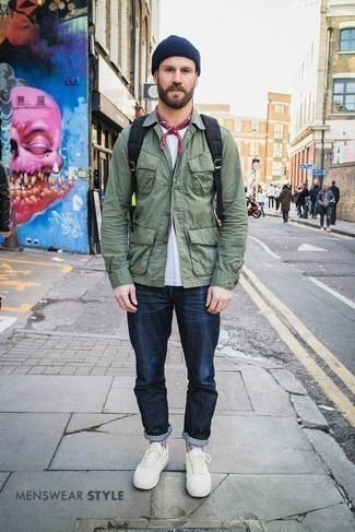 Olive Shirt Jacket Outfits For Men: An olive shirt jacket and navy jeans are must-have menswear must-haves if you're picking out an off-duty wardrobe that matches up to the highest sartorial standards. With footwear, go for something on the laid-back end of the spectrum by rounding off with white canvas low top sneakers.