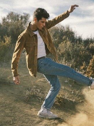 Tan Corduroy Shirt Jacket Outfits For Men: For a sharp look without the need to sacrifice on practicality, we love this pairing of a tan corduroy shirt jacket and blue jeans. Infuse a sense of stylish effortlessness into this look by wearing a pair of white canvas high top sneakers.