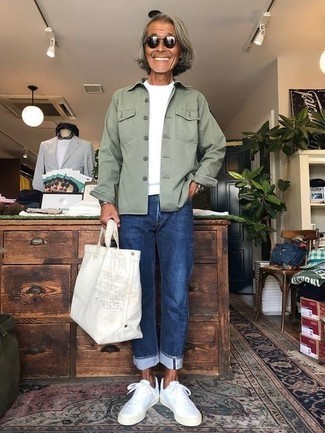 Green Shirt Jacket Outfits For Men: Why not opt for a green shirt jacket and blue jeans? As well as super comfortable, these items look nice when worn together. A pair of white canvas low top sneakers easily bumps up the fashion factor of this getup.